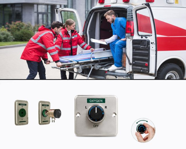 Paramedics loading a patient into an ambulance with a manual oxygen changeover system, oxygen outlets, and Dial flowmeter .components shown below.